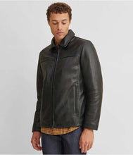 Load image into Gallery viewer, Man wearing a black leather jacket on a light gray background