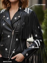 Load image into Gallery viewer, Close up macro view of the premium genuine leather tassels on the sleeve of the jacket.