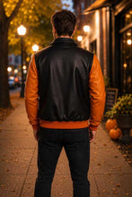 Load image into Gallery viewer, Best pumpkin leather bomber jacket for sale featuring black body and Halloween lettering

