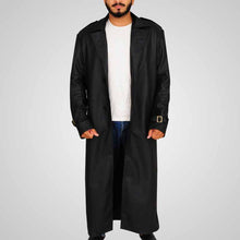 Load image into Gallery viewer, Person wearing a long black coat over a white shirt
